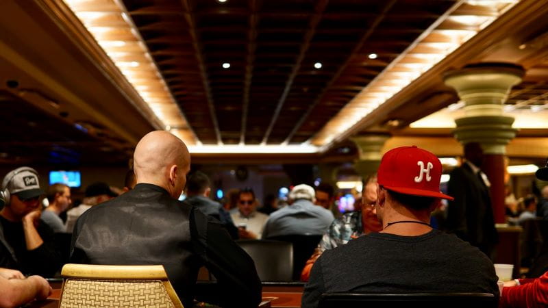 Players at a poker table.